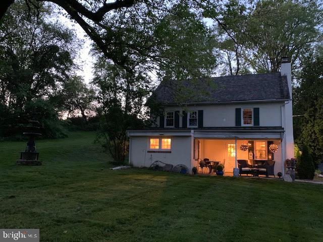776 W Road West Grove, PA 19390 - Photo 25 of 26 a front view of a house with a garden