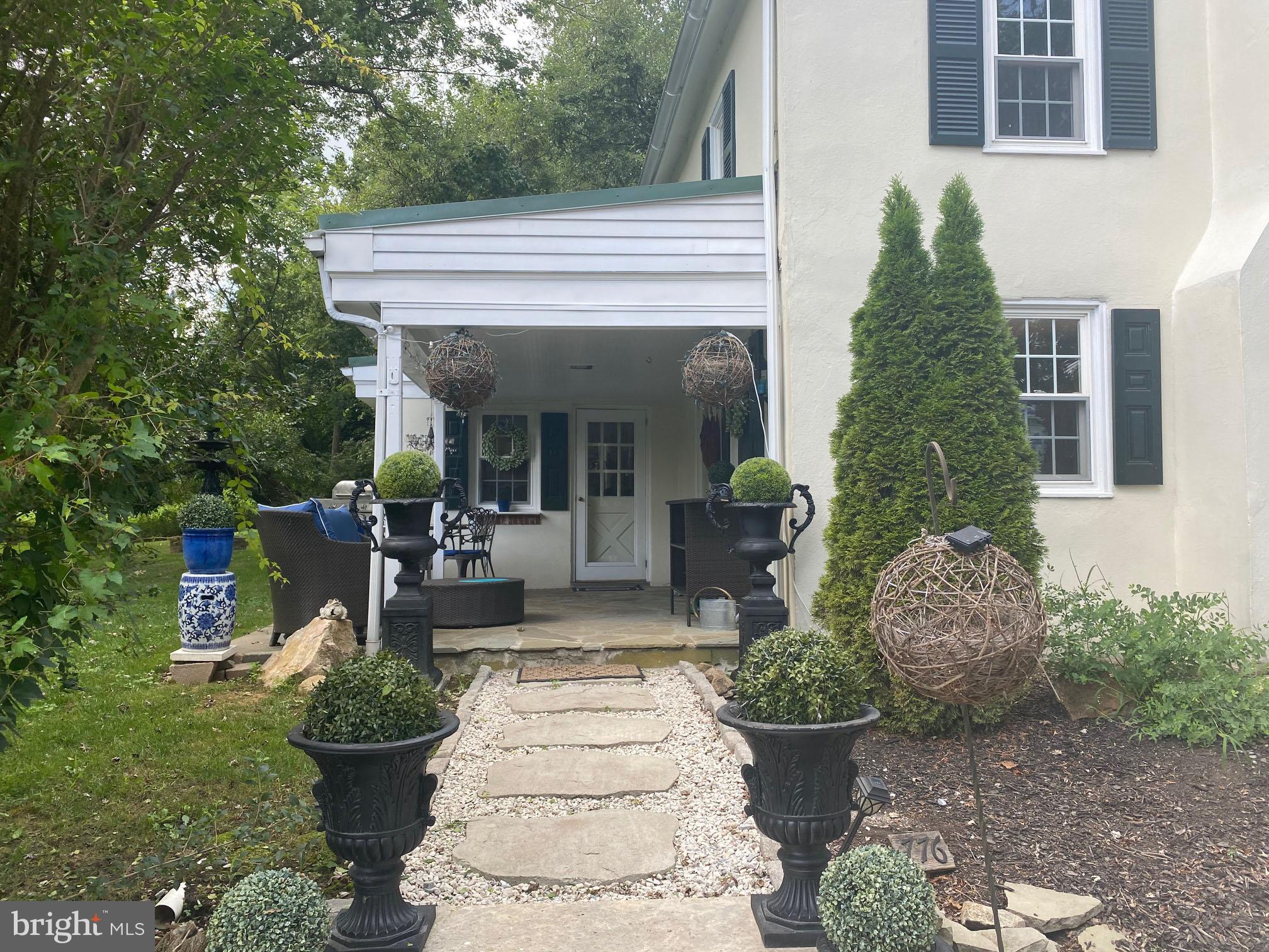 776 W Road West Grove, PA 19390 - Photo 3 of 26 a front view of a house with garden