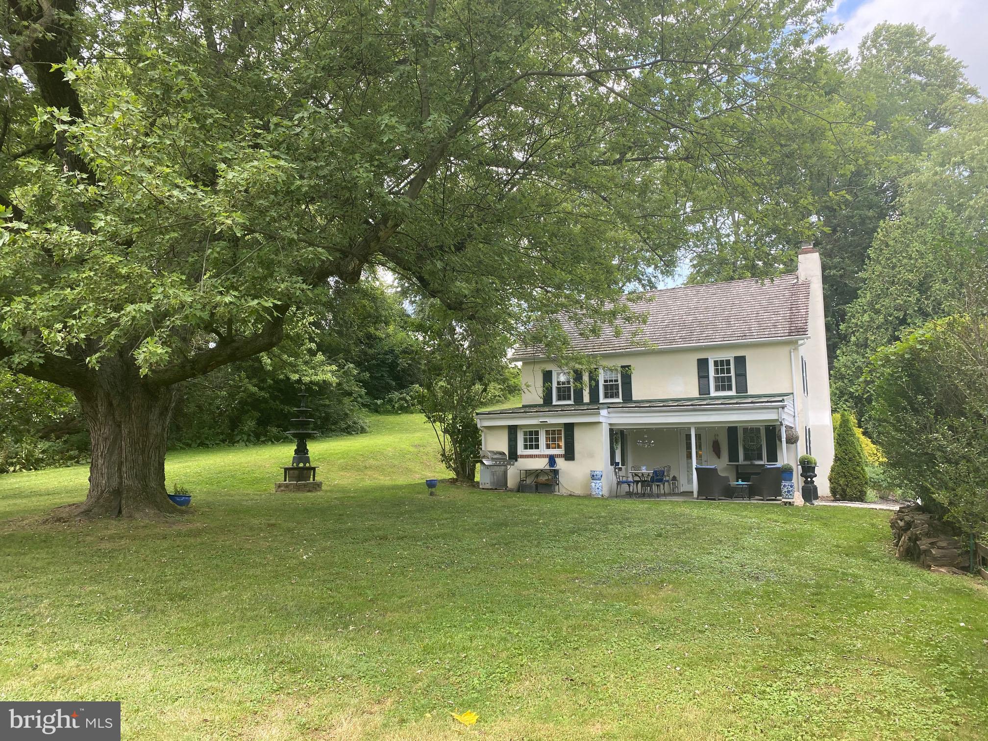 776 W Road West Grove, PA 19390 - Photo 5 of 26 a house view with a garden space