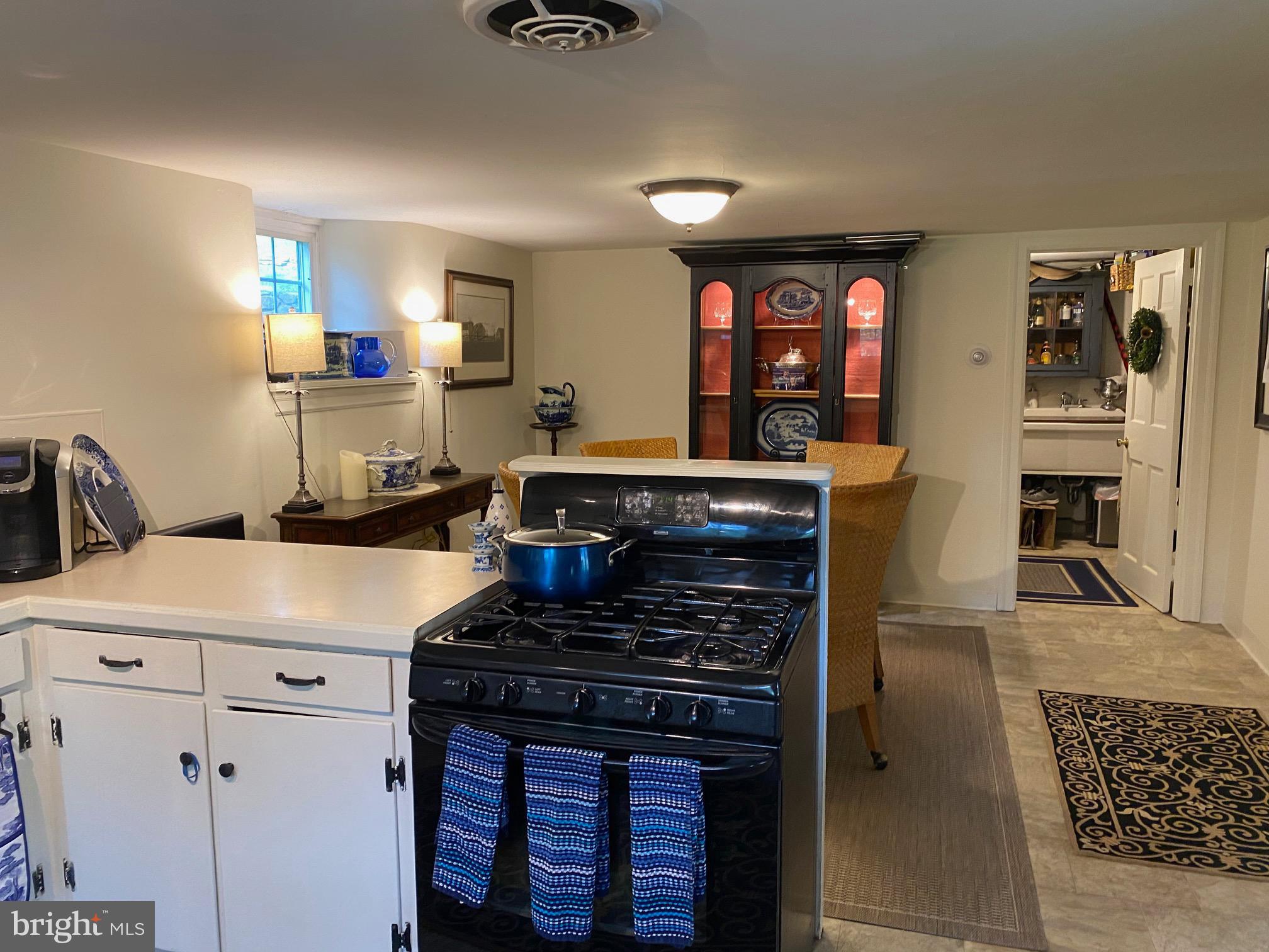 776 W Road West Grove, PA 19390 - Photo 8 of 26 a kitchen with a stove and a refrigerator