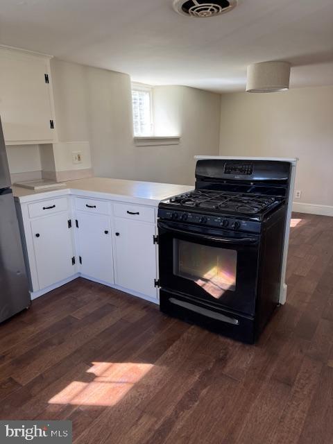 776 W Road West Grove, PA 19390 - Photo 9 of 26 a kitchen with a fireplace and wooden floor