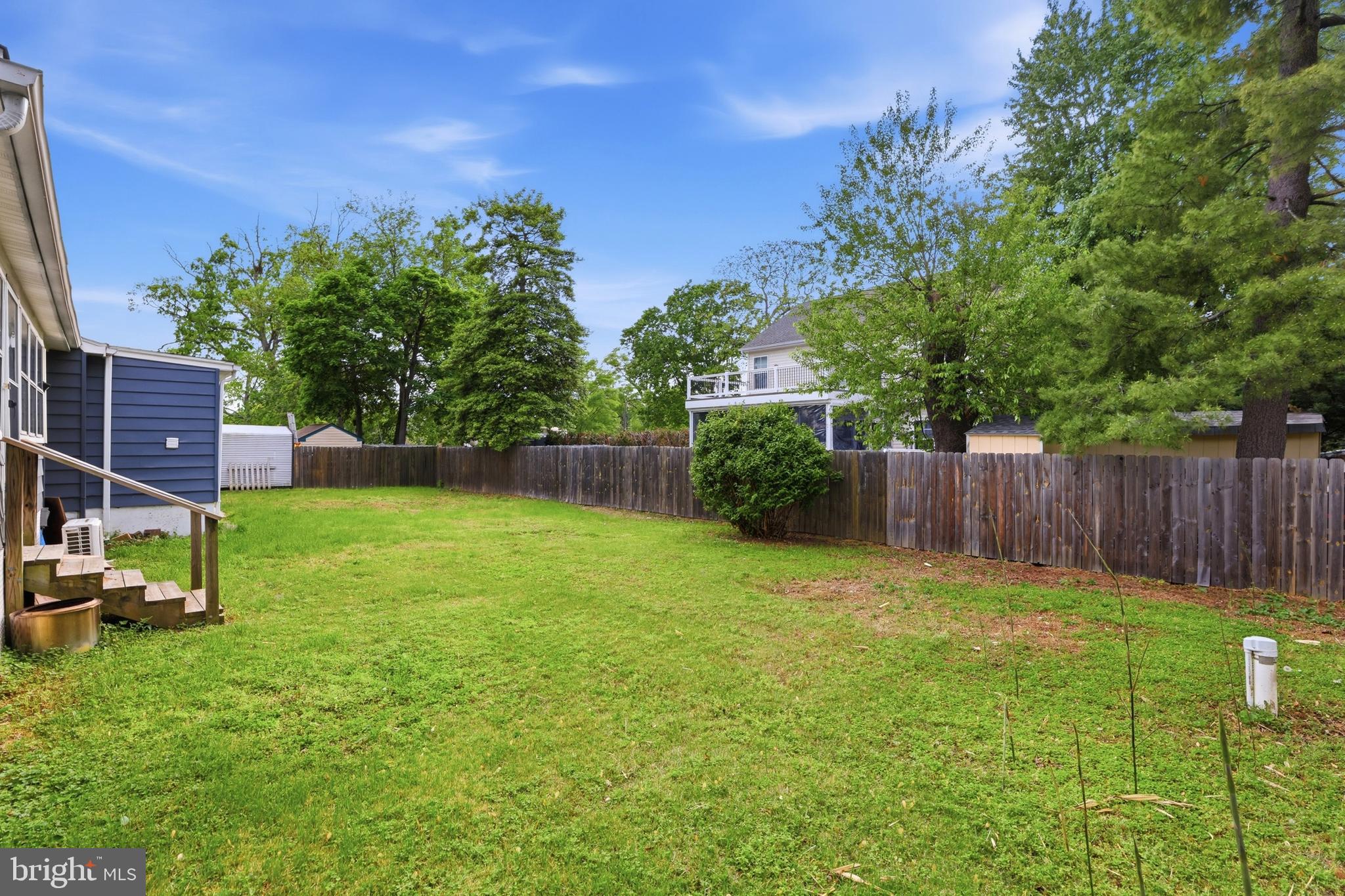 1816 Keymar Road Edgewater, MD 21037 - Photo 32 of 42 a view of a backyard with a tree