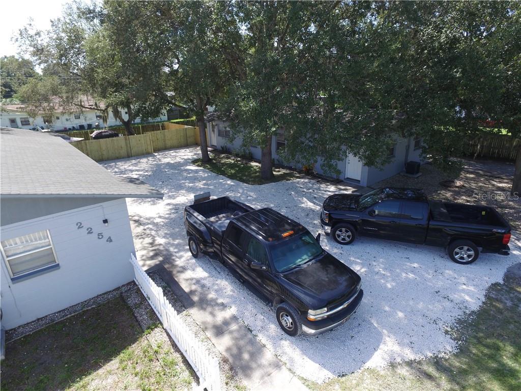 2278 19th Avenue Southwest Largo, FL 33774 - Photo 1 of 1 a backyard of a house with barbeque oven