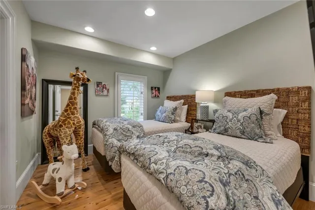 a utility room with cabinets washer and dryer