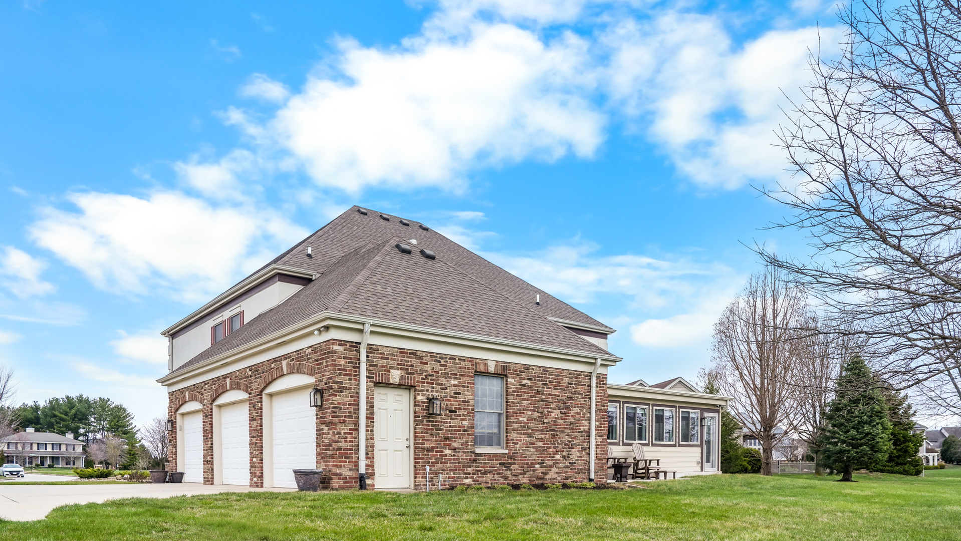 1607 Chestnut Grove Court Champaign, IL 61822 - Photo 105 of 113 a front view of a house with a yard