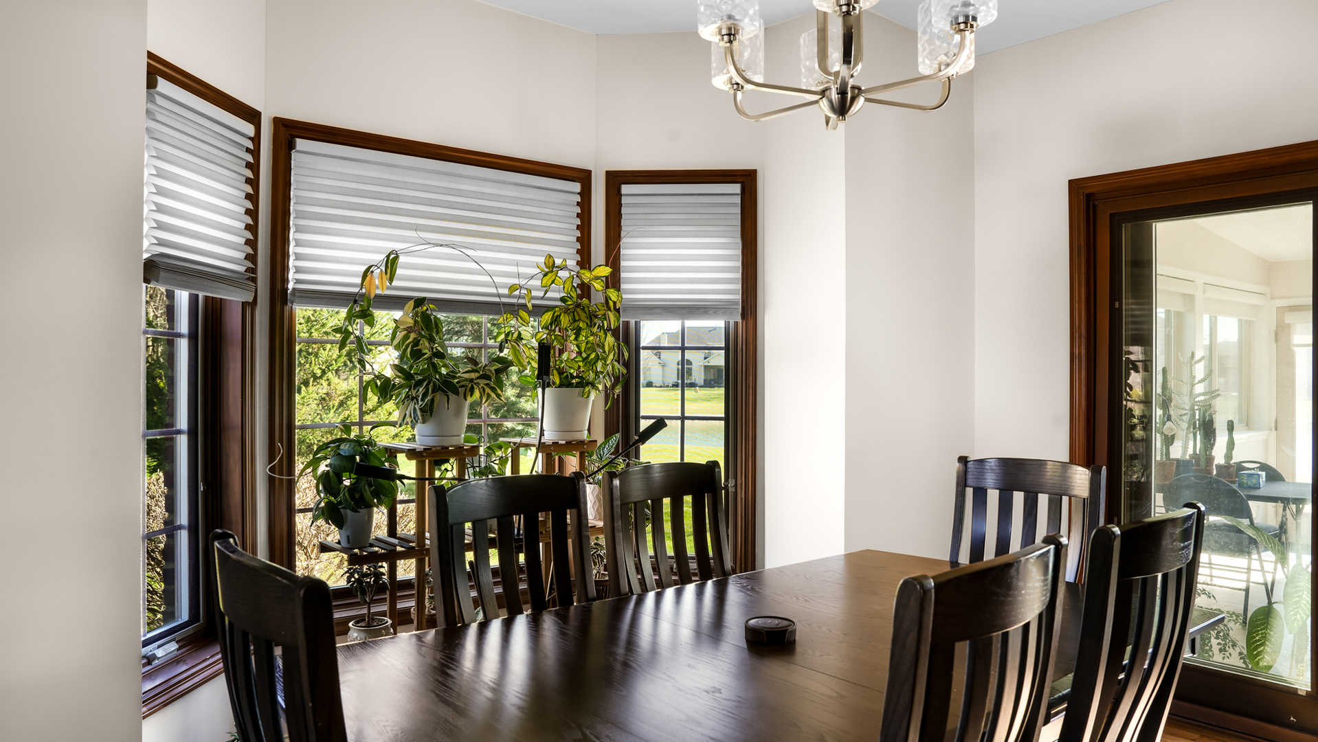 1607 Chestnut Grove Court Champaign, IL 61822 - Photo 28 of 113 a view of a dining room with furniture window and outside view