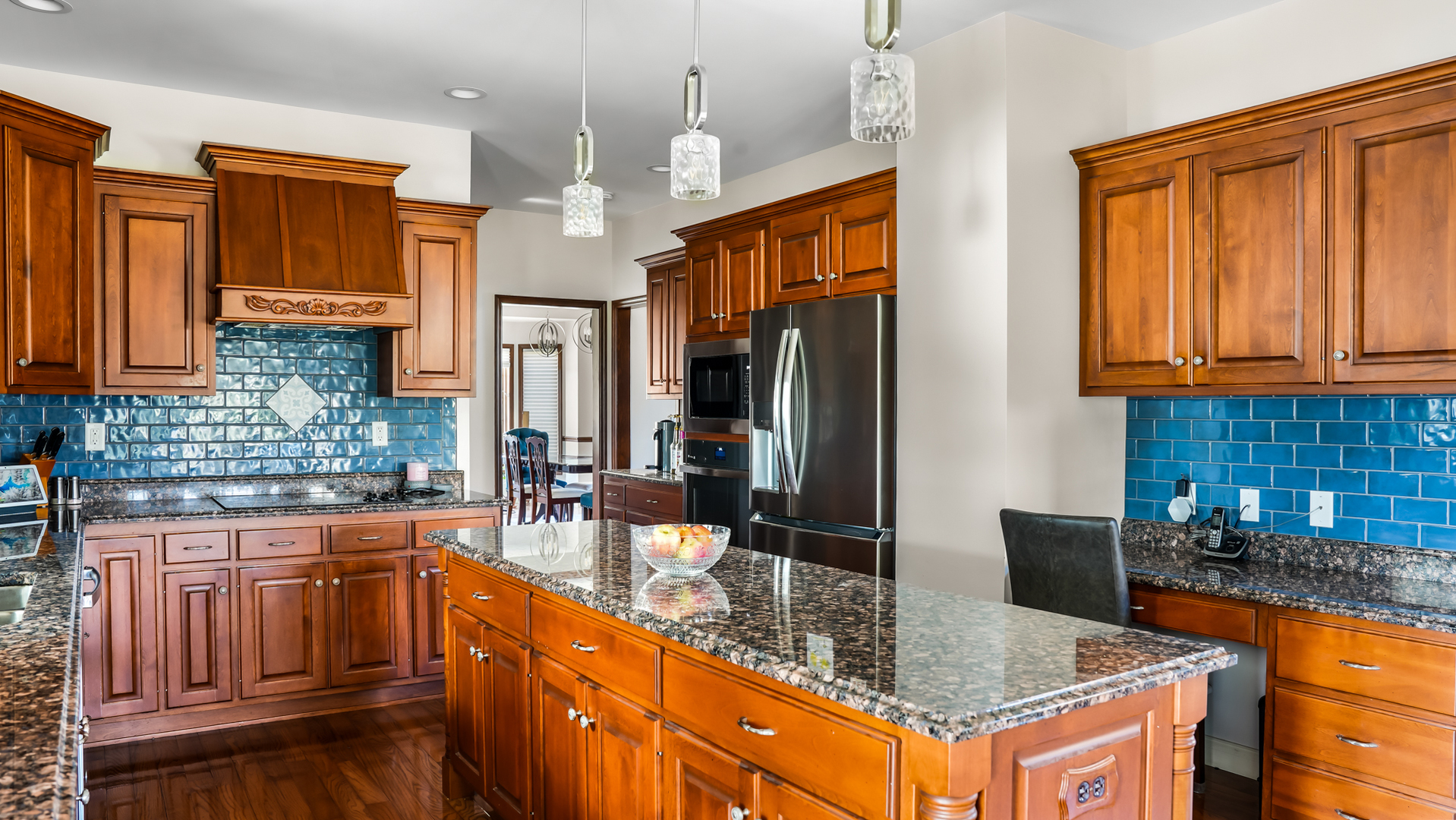 1607 Chestnut Grove Court Champaign, IL 61822 - Photo 35 of 113 a kitchen with stainless steel appliances granite countertop a sink a stove and a refrigerator
