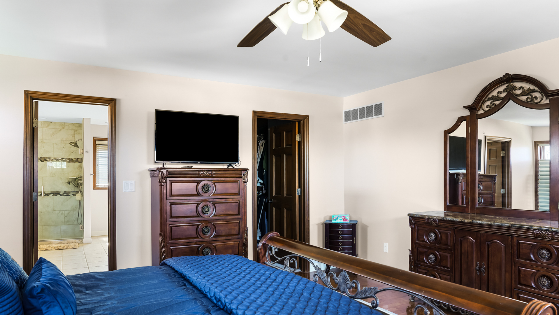1607 Chestnut Grove Court Champaign, IL 61822 - Photo 65 of 113 a view of a livingroom with furniture and a flat screen tv