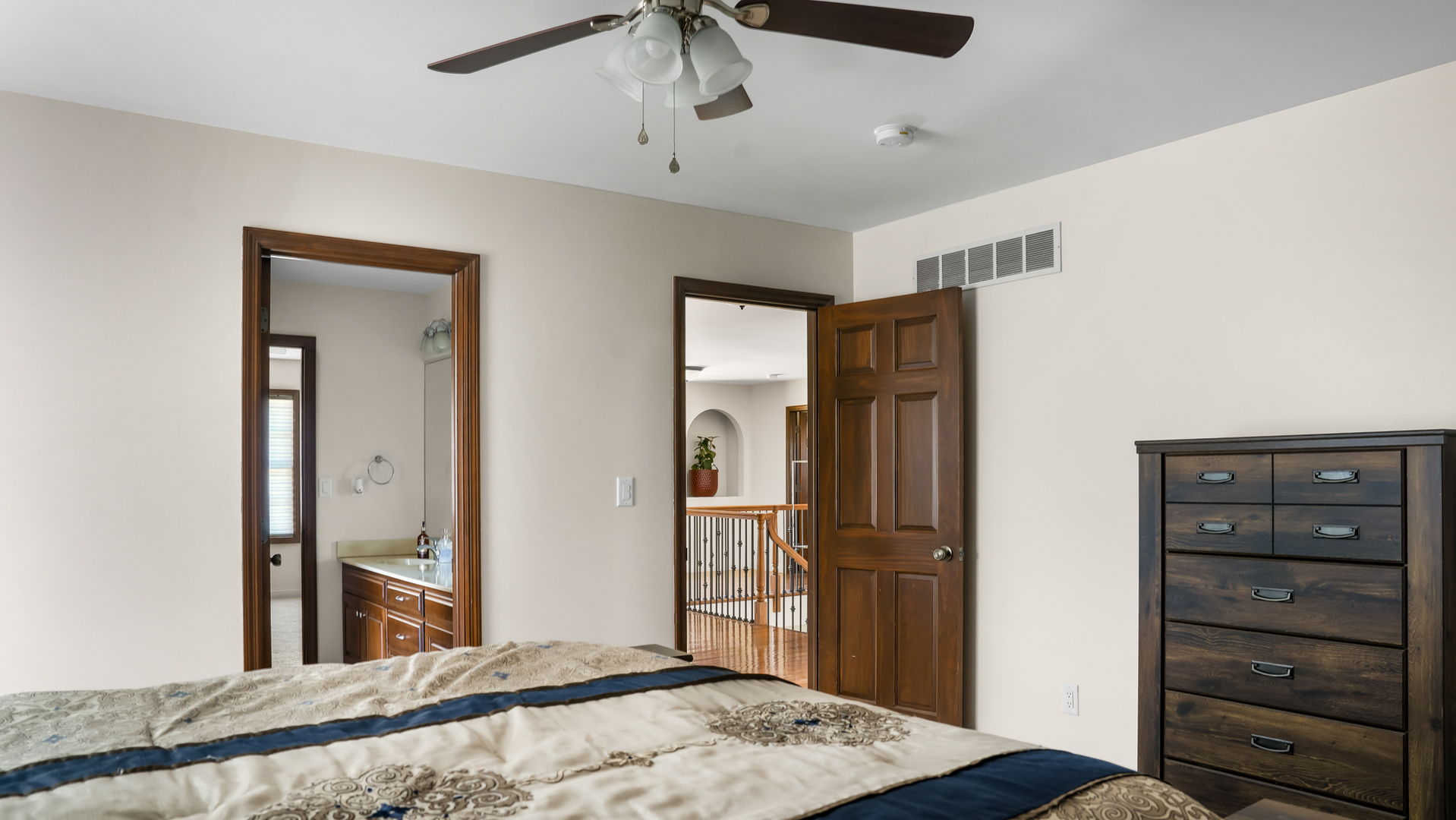 1607 Chestnut Grove Court Champaign, IL 61822 - Photo 76 of 113 a bedroom with a bed and wooden floor