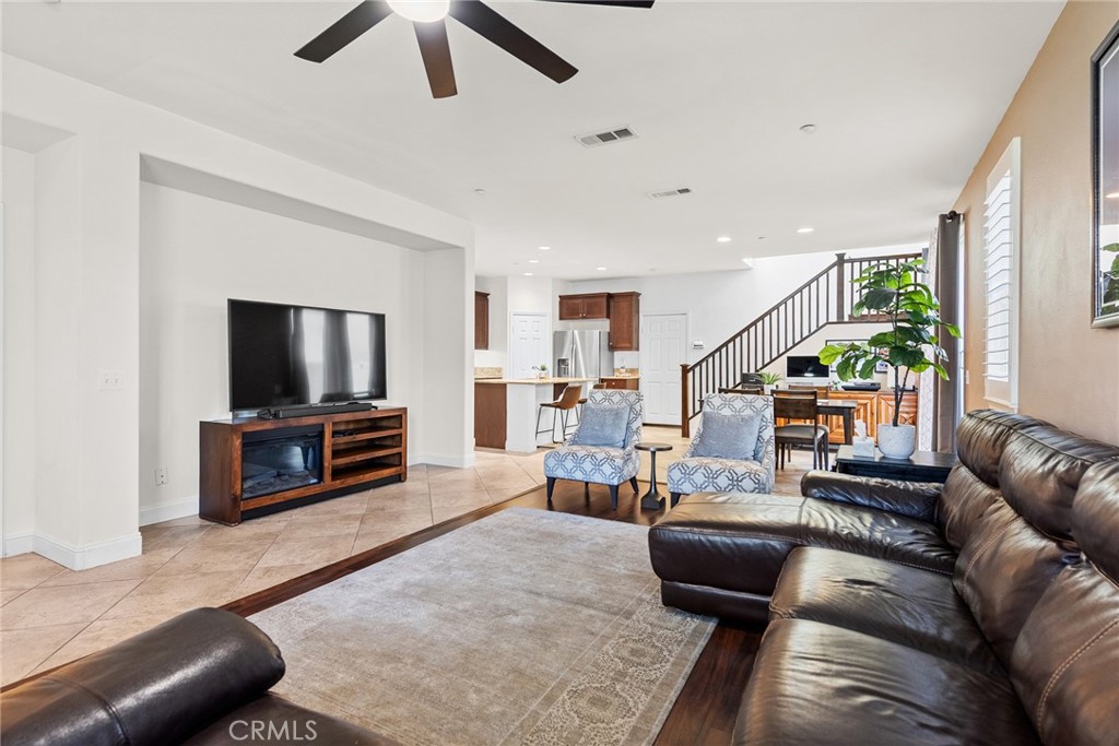 1749 Catania Drive Riverside, CA 92507 - Photo 13 of 39 a living room with furniture and a flat screen tv