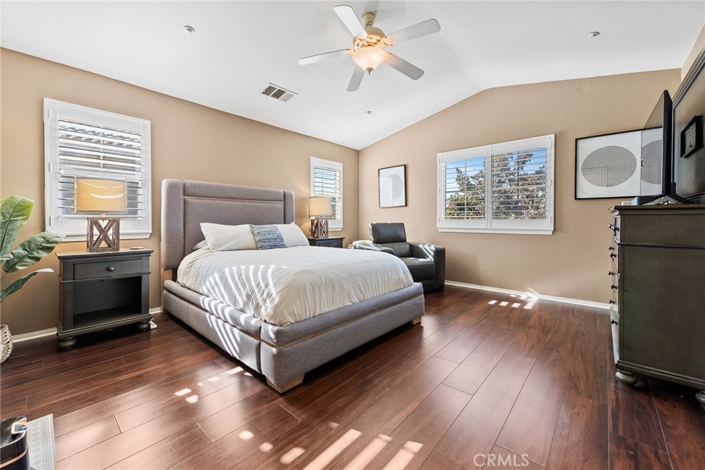 1749 Catania Drive Riverside, CA 92507 - Photo 24 of 39 a bedroom with a bed flat screen tv and window