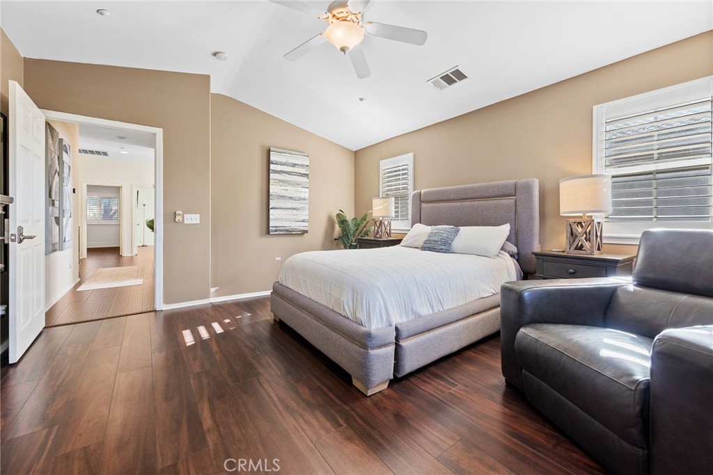 1749 Catania Drive Riverside, CA 92507 - Photo 25 of 39 a bedroom with a bed couch and window