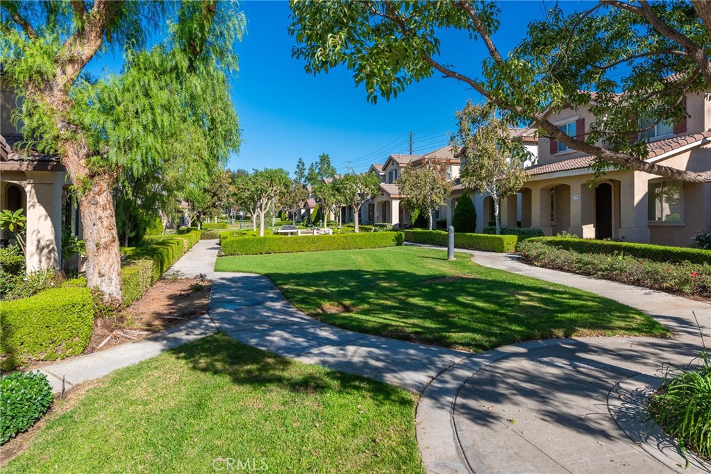 1749 Catania Drive Riverside, CA 92507 - Photo 33 of 39 a view of a house with a yard