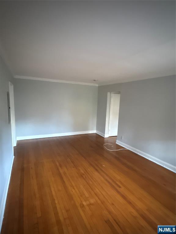 166 Grand Avenue, Unit A7 Englewood, NJ 07631 - Photo 2 of 12 a view of empty room with wooden floor