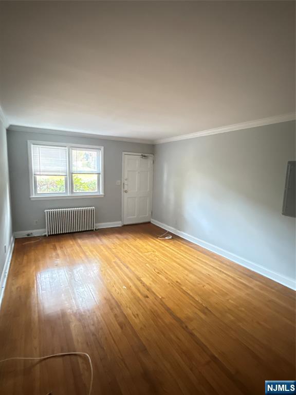 166 Grand Avenue, Unit A7 Englewood, NJ 07631 - Photo 3 of 12 an empty room with a empty space and windows