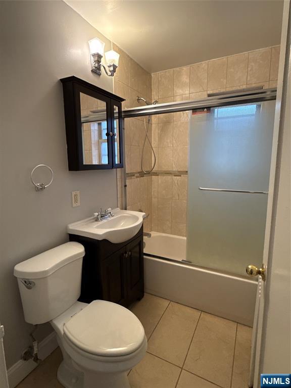 166 Grand Avenue, Unit A7 Englewood, NJ 07631 - Photo 7 of 12 a bathroom with a sink toilet and shower