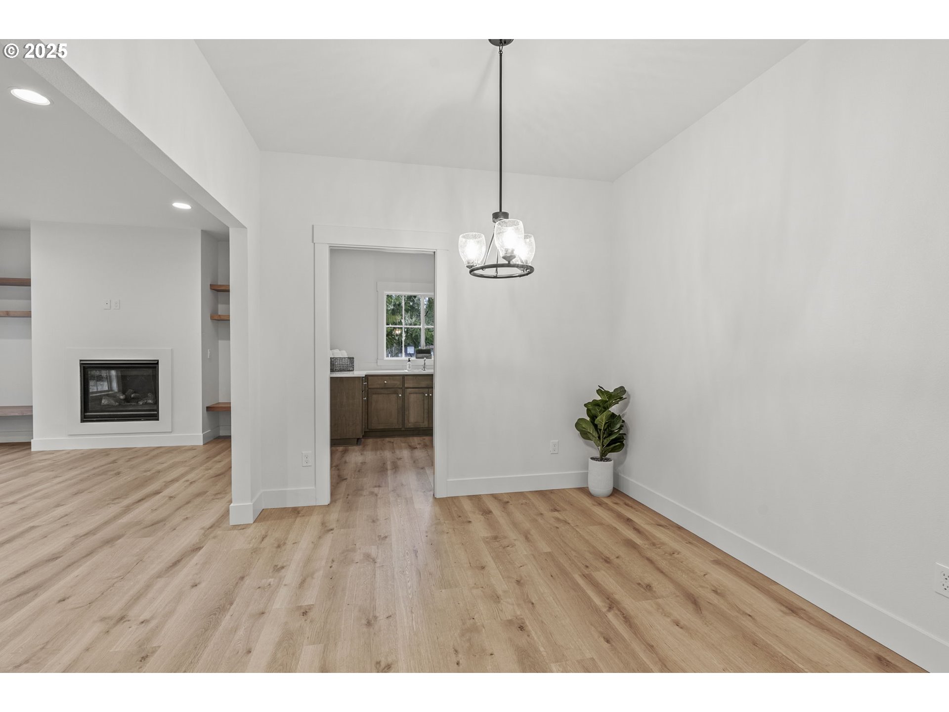 960 Paine Road Castle Rock, WA 98611 - Photo 11 of 32 a view of an empty room with wooden floor