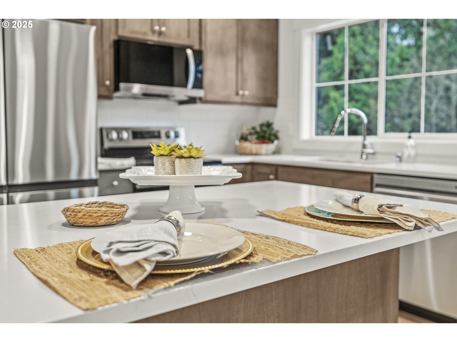 960 Paine Road Castle Rock, WA 98611 - Photo 19 of 32 a kitchen with a stove a sink and a white cabinets
