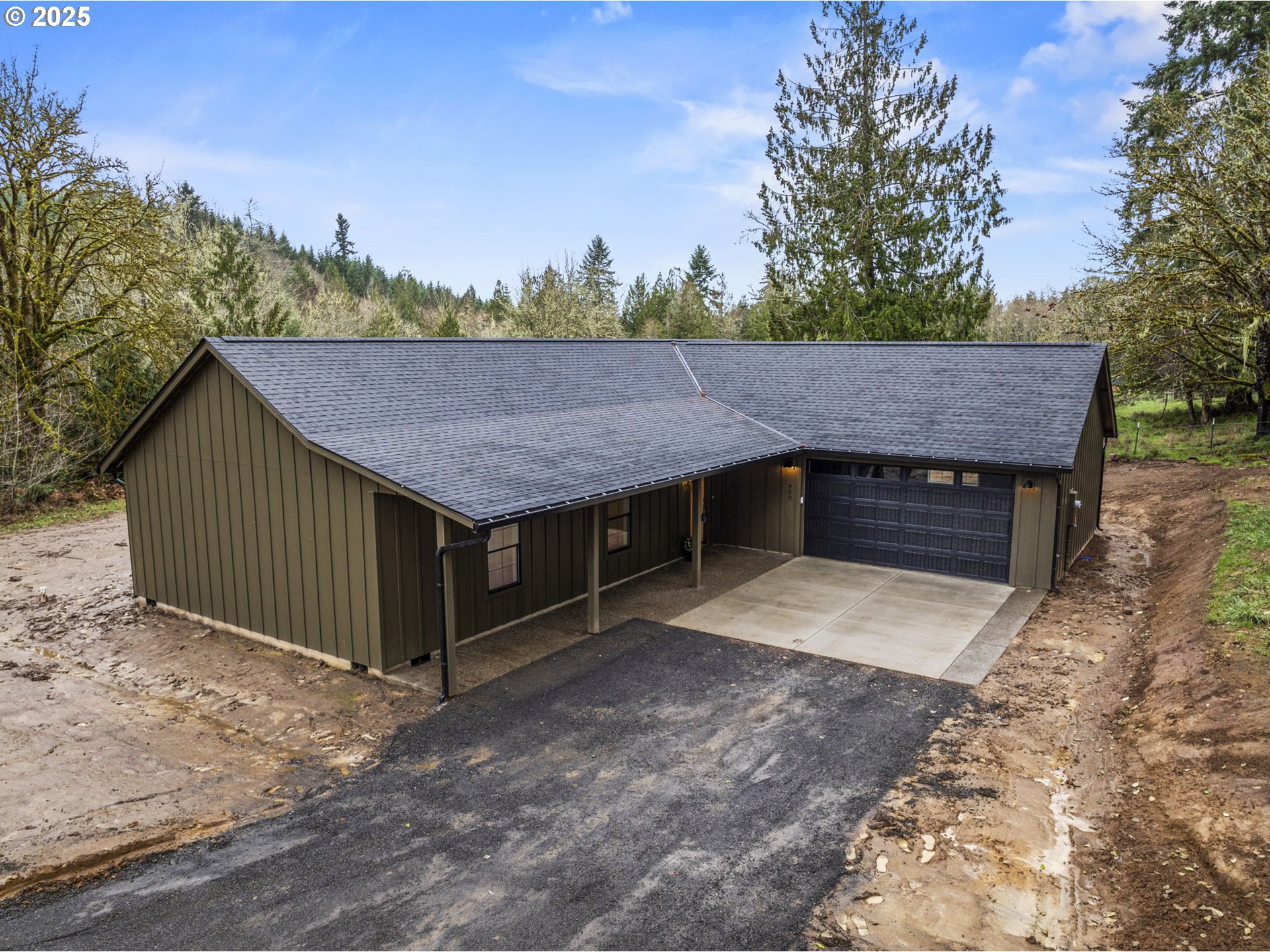 960 Paine Road Castle Rock, WA 98611 - Photo 2 of 32 a view of a house with a sink and wooden fence