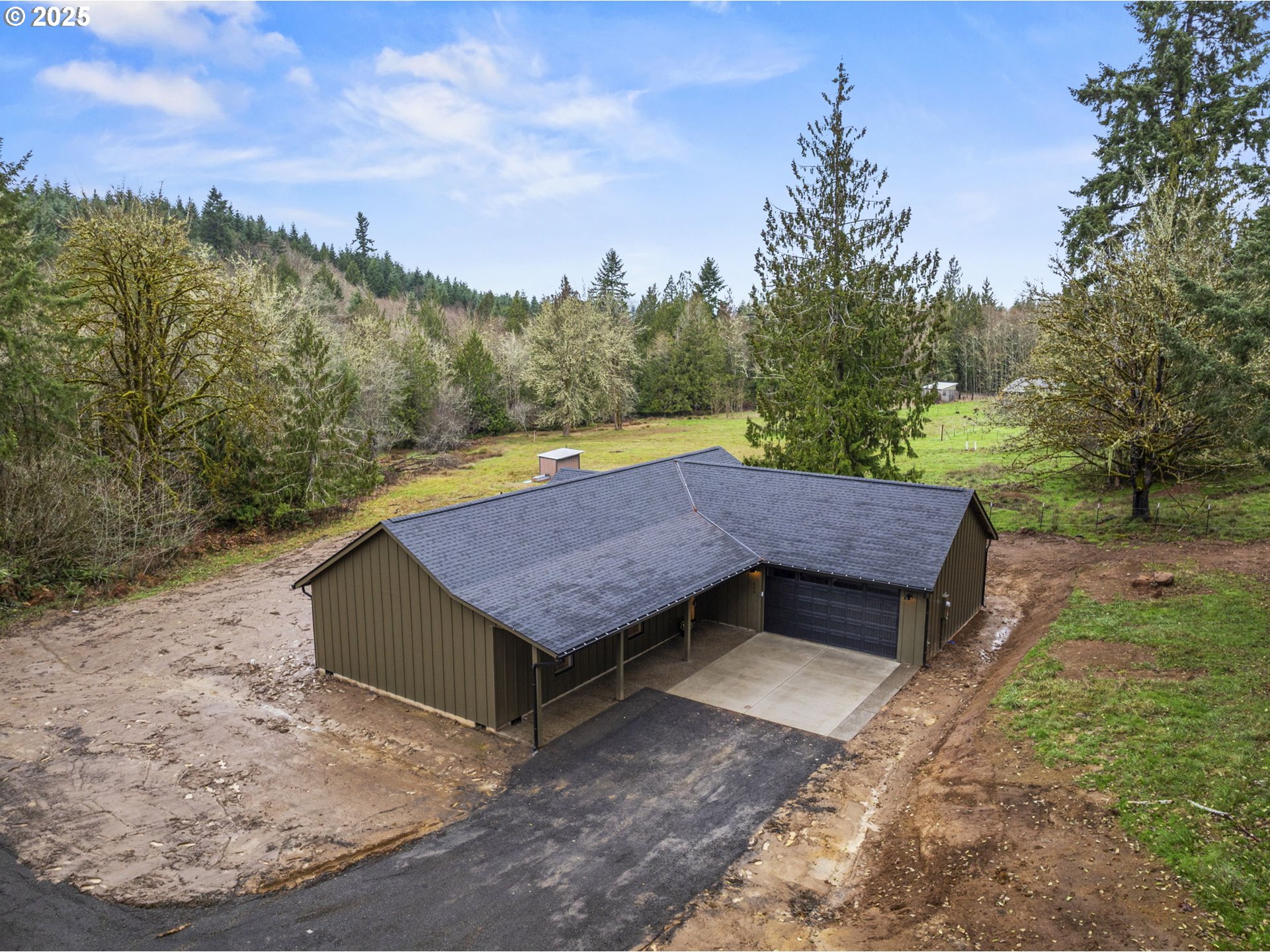 960 Paine Road Castle Rock, WA 98611 - Photo 3 of 32 an aerial view of a house with a yard
