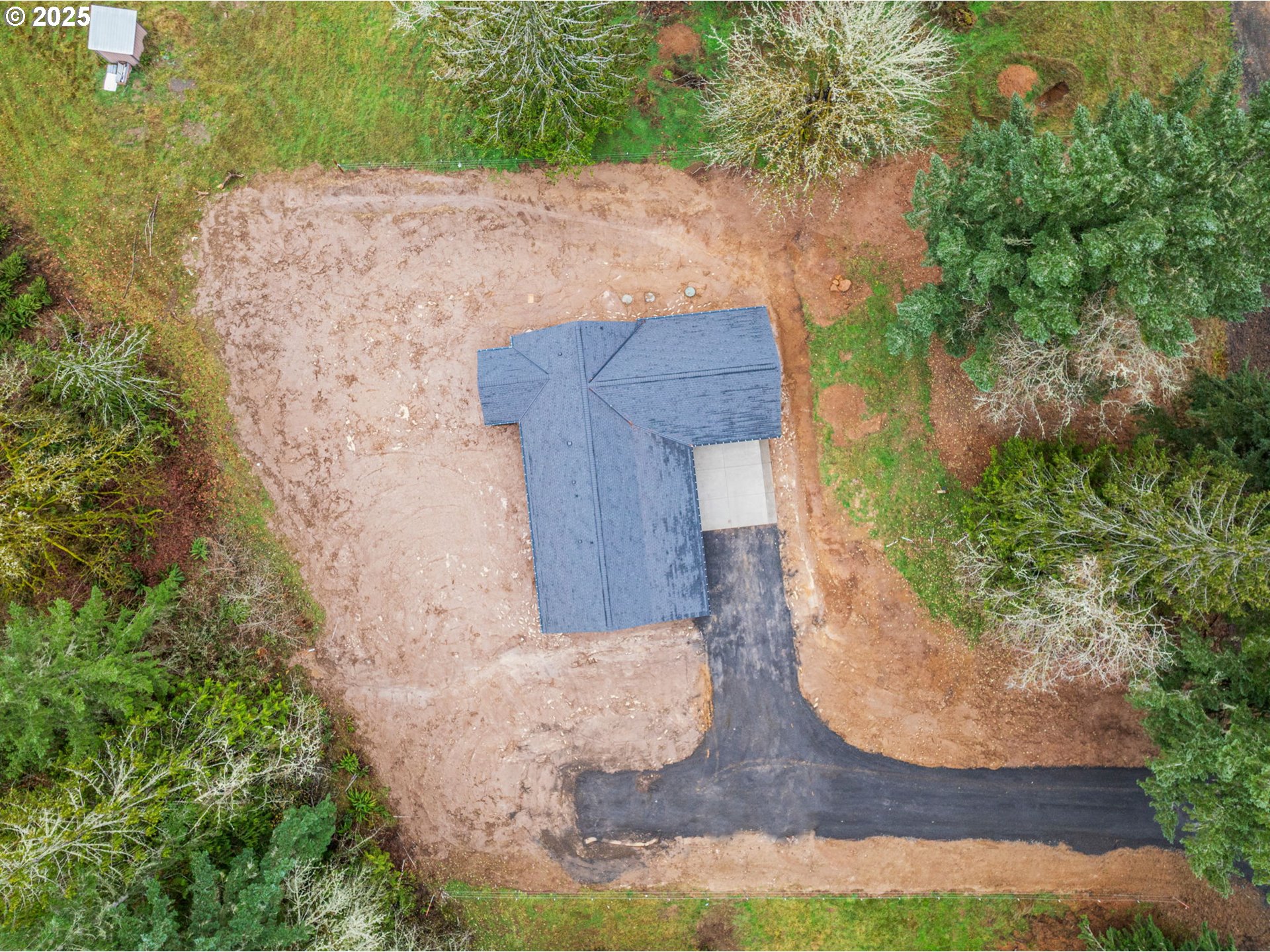 960 Paine Road Castle Rock, WA 98611 - Photo 5 of 32 an aerial view of a house with a yard