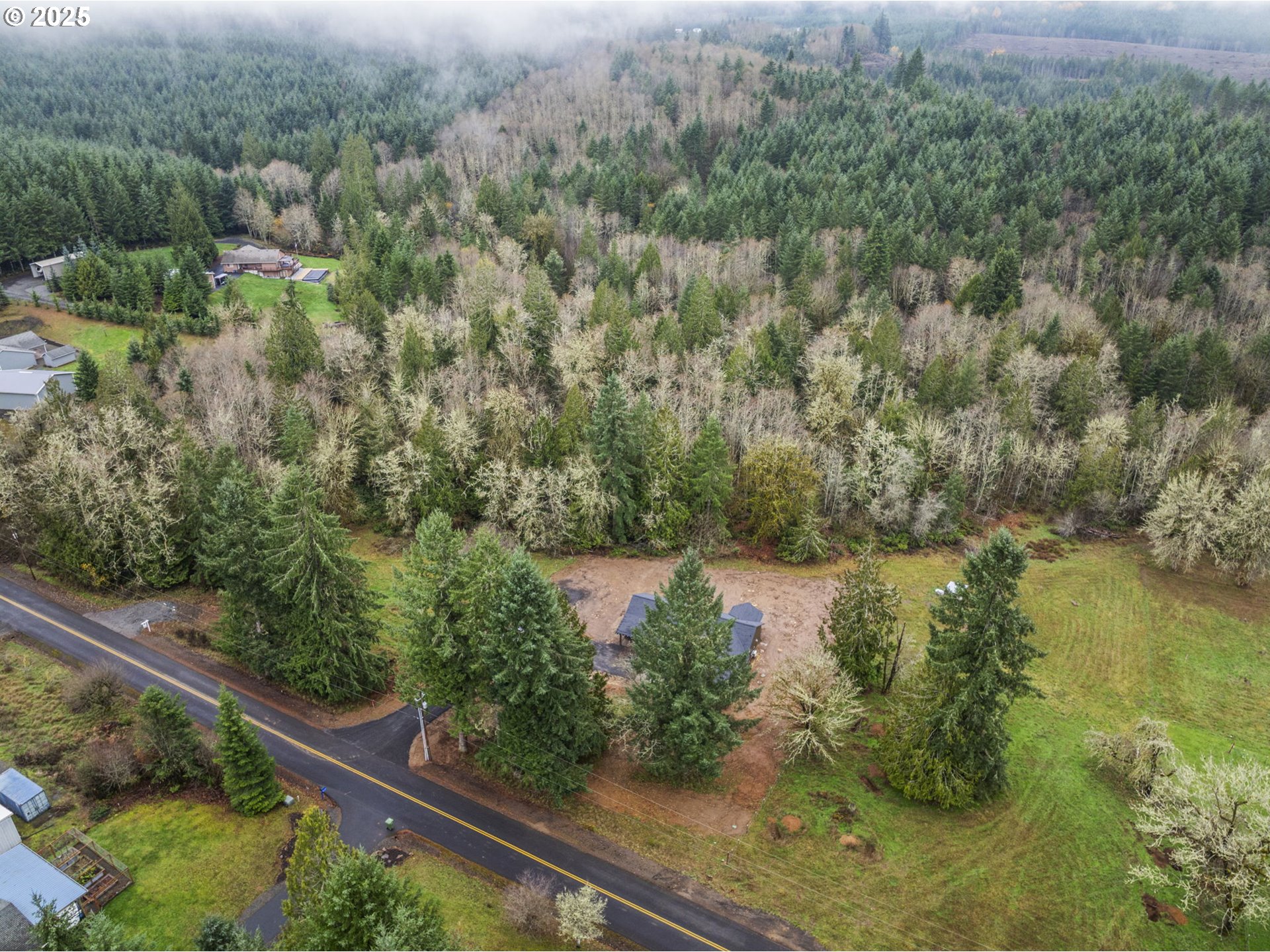 960 Paine Road Castle Rock, WA 98611 - Photo 9 of 32 a view of a lake from a balcony