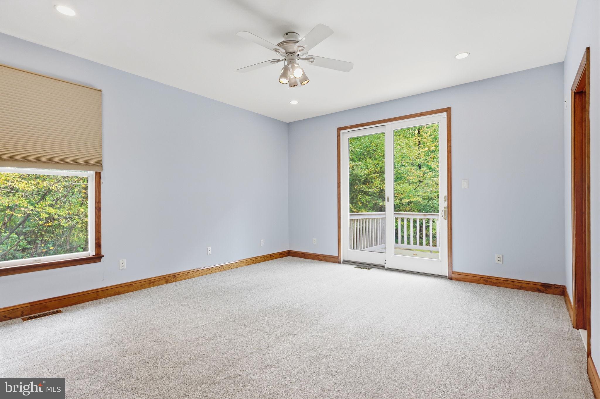 1669 Fennel Road Quakertown, PA 18951 - Photo 35 of 68 Primary Bedroom with sliders to back deck
