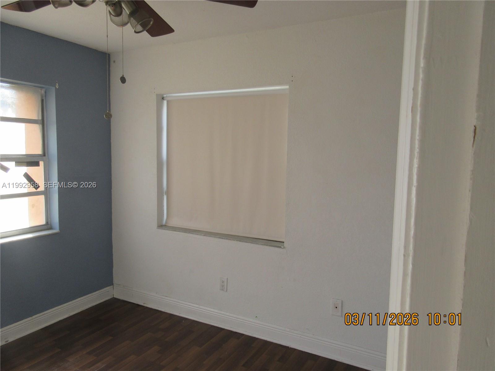 18420 Southwest 129th Avenue Miami, FL 33177 - Photo 13 of 17 a view of a small space with wooden floor and a window