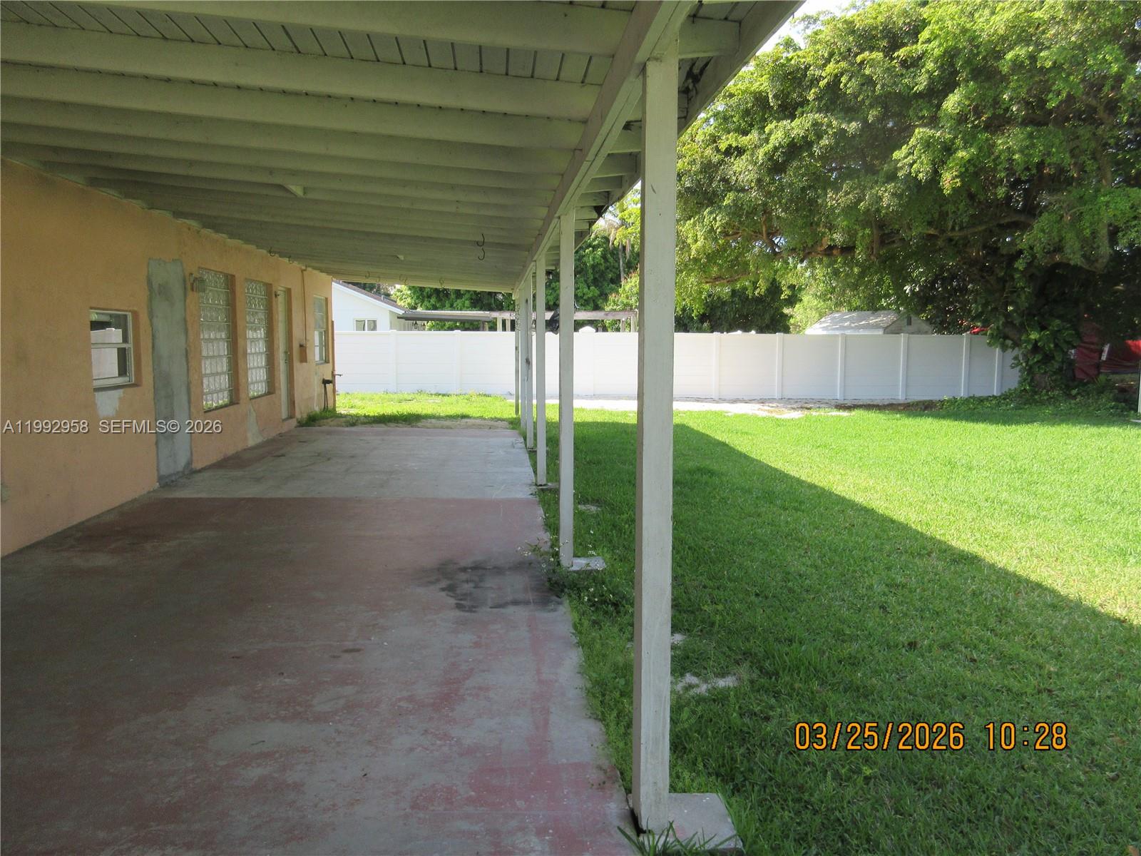 18420 Southwest 129th Avenue Miami, FL 33177 - Photo 15 of 17 a view of backyard with green space