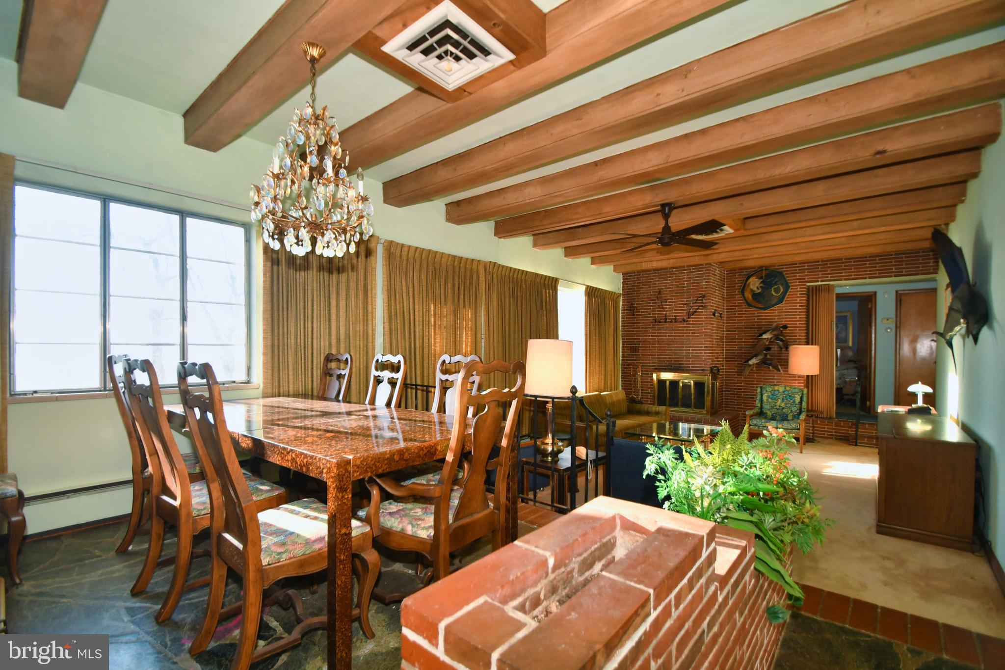 610 Otter Point Road Abingdon, MD 21009 - Photo 14 of 35 A Brick Planter separates "walk-thru" from D .R.