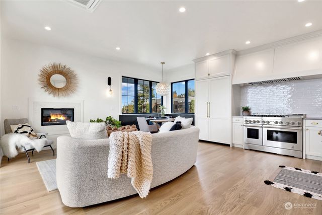 a large bedroom with a bed and window