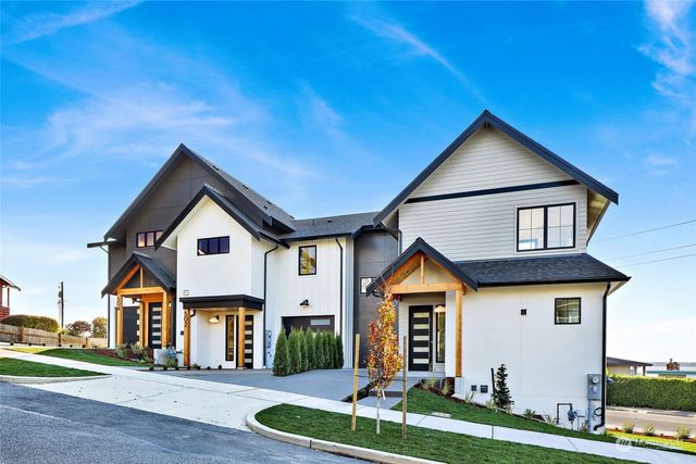 a view of a swimming pool with a lounge chair