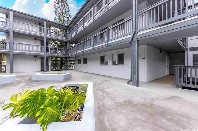 a view of a swimming pool with an outdoor space