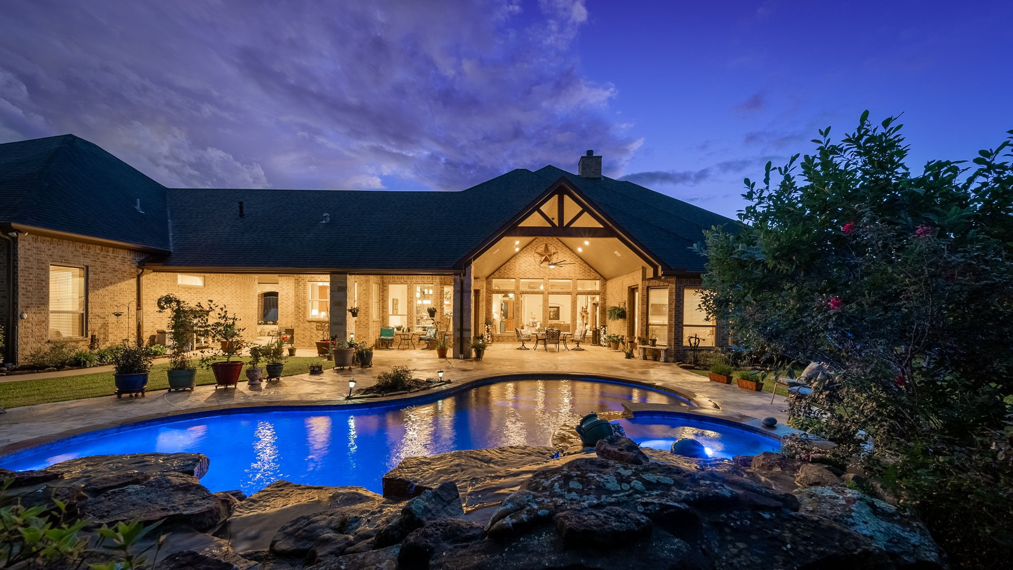 28502 Crawford Ridge Court Huffman, TX 77336 - Photo 2 of 50 a view of a house with a swimming pool outdoor seating