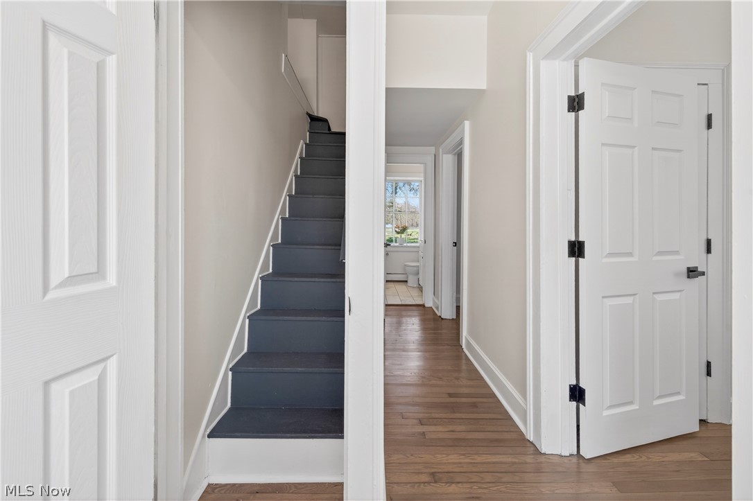 14939 Caves Road Novelty, OH 44072 - Photo 31 of 42 Stairs with wood-type flooring and baseboards
