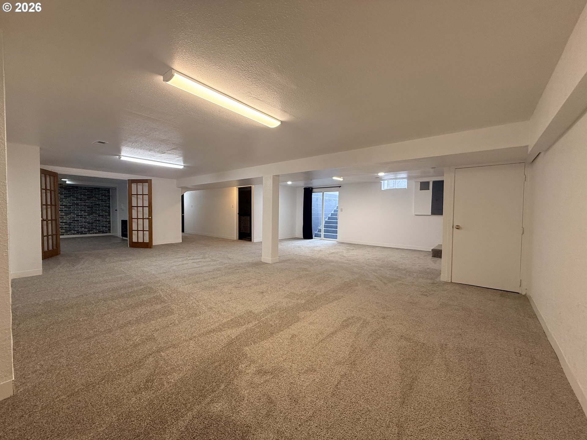 2126 Lewis River Road Woodland, WA 98674 - Photo 22 of 27 a view of a big room with closet and windows
