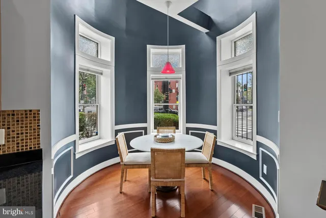a view of a dining room with furniture window and outside view