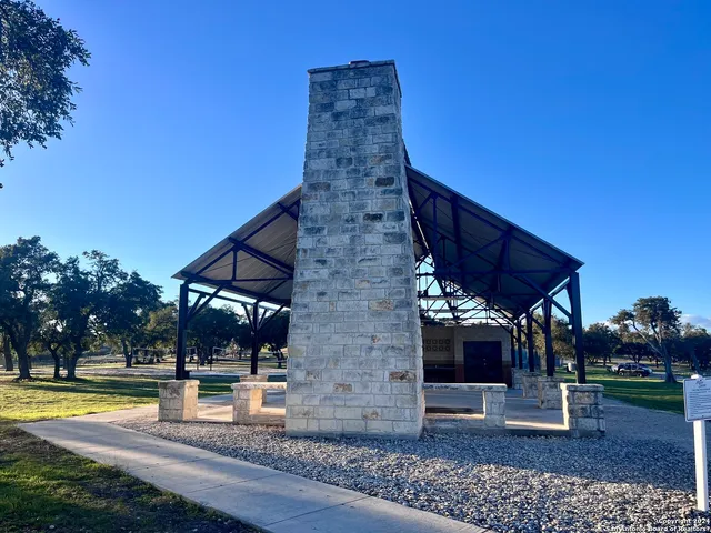a view of a backyard of the house