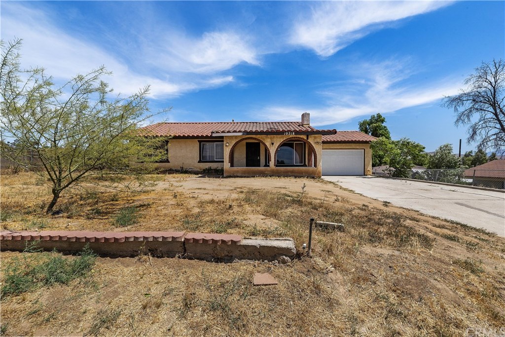 10218 Mull Avenue Riverside, CA 92503 - Photo 1 of 1 View of front of home. Brand new garage door, rails etc