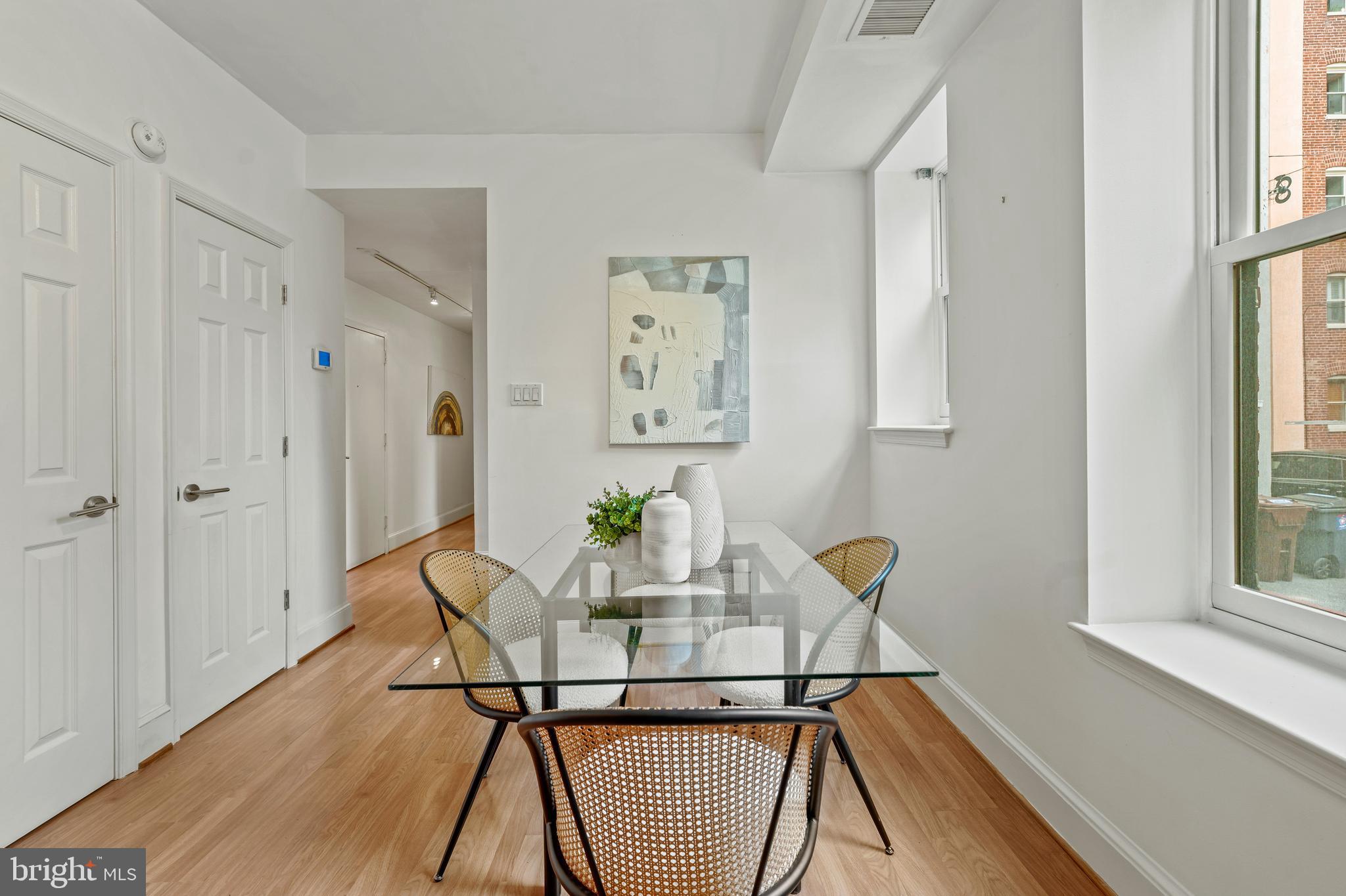 1733 20th Street Northwest, Unit 103 Washington, DC 20009 - Photo 11 of 30 Coat closet and deep storage closet in LR/DR area