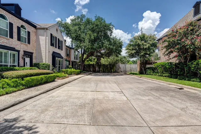 a house view with a garden space