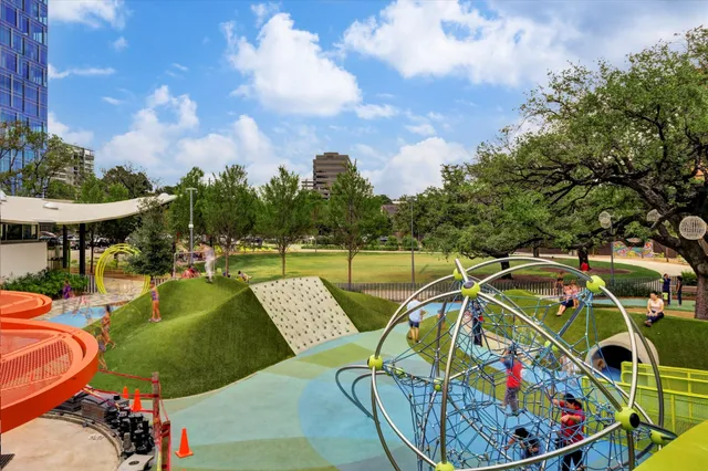 a view of a swimming pool with a couches in a patio