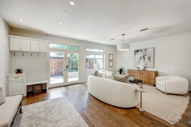 a living room with furniture and a couch