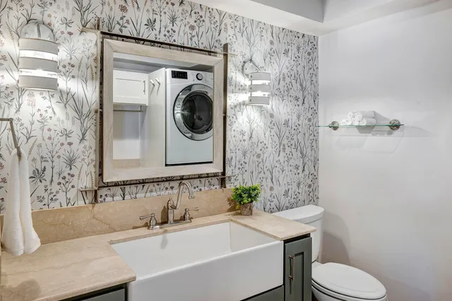 a bathroom with a sink and a toilet