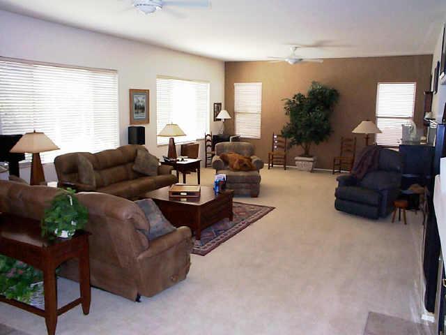 495 East Ranch Road Gilbert, AZ 85296 - Photo 4 of 6 a living room with furniture and a large window