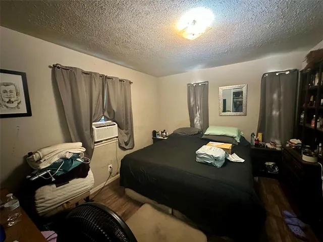 a bedroom with furniture and a equipment