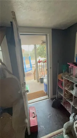 a stove top oven sitting inside of a kitchen