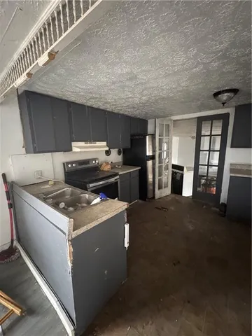 a view of a hallway with windows