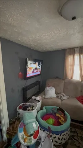 a kitchen with a sink appliances and cabinets