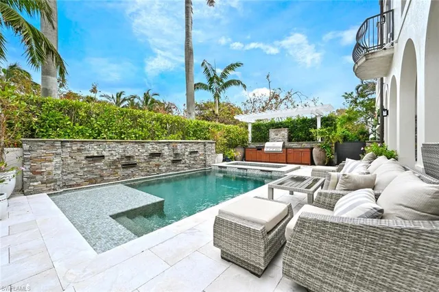 a view of living room filled with furniture